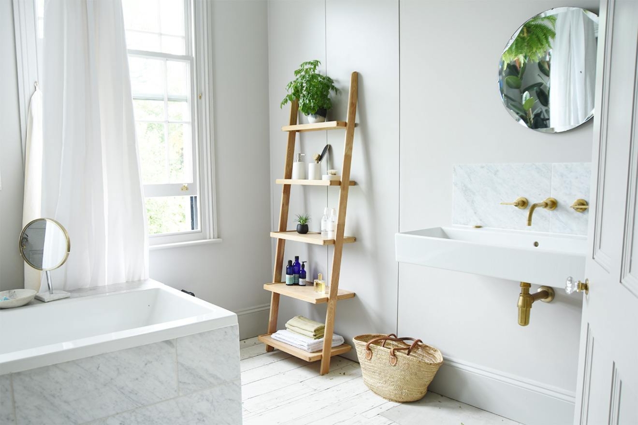 Oak Leaning Ladder Shelves in a bathroom